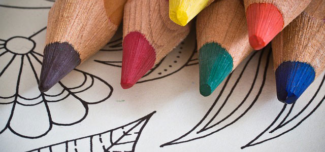 Coloring page and pencils.